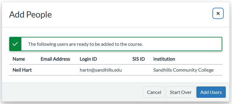 A green check mark showing adding a person to a course.